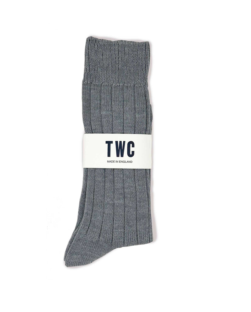 LAMBSWOOL CHECK SCARF + MERINO WOOL SOCKS IN LIGHT GREY + MERINO WOOL SOCKS IN CHARCOAL + LEATHER CARD HOLDER + Natural Veg-tan LEATHER KEY FOB + BEANIE